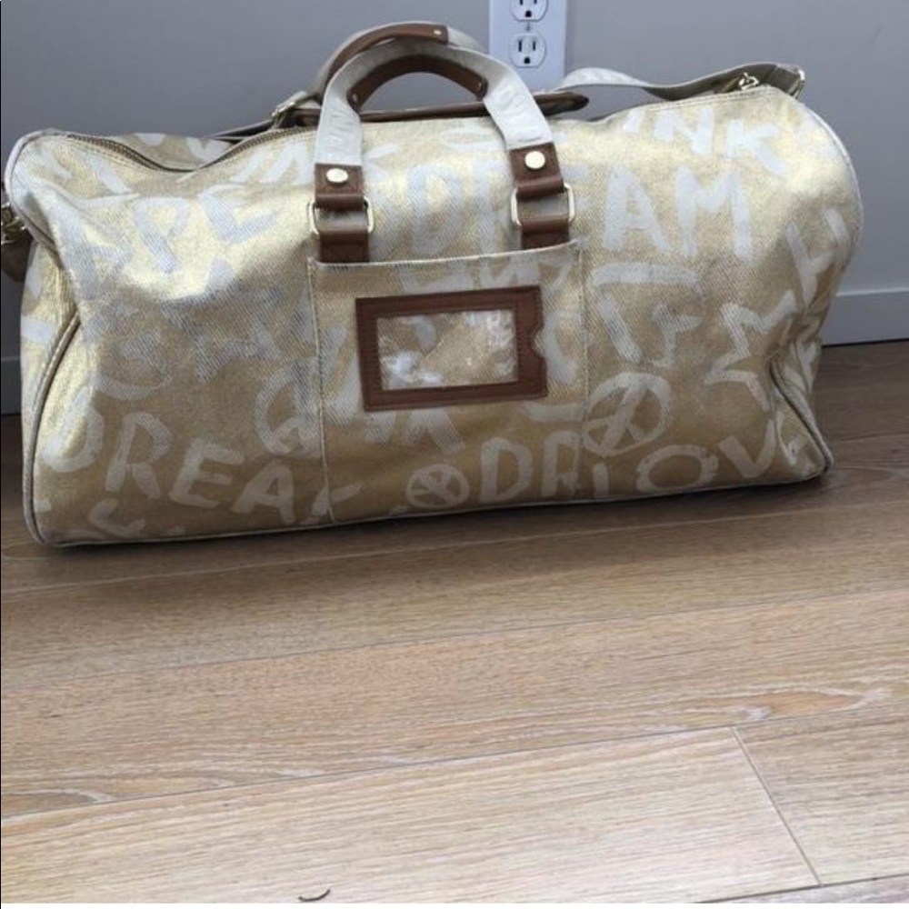 Victoria secret travel duffel bag. Gold.